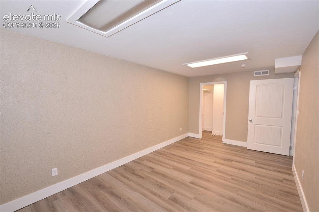 Image 20 of 33: Bedroom in basement