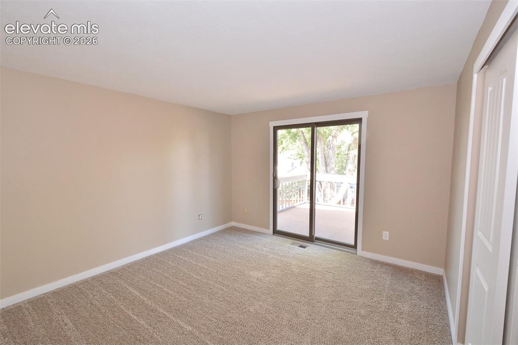 Image 23 of 33: 2nd bedroom on upper level