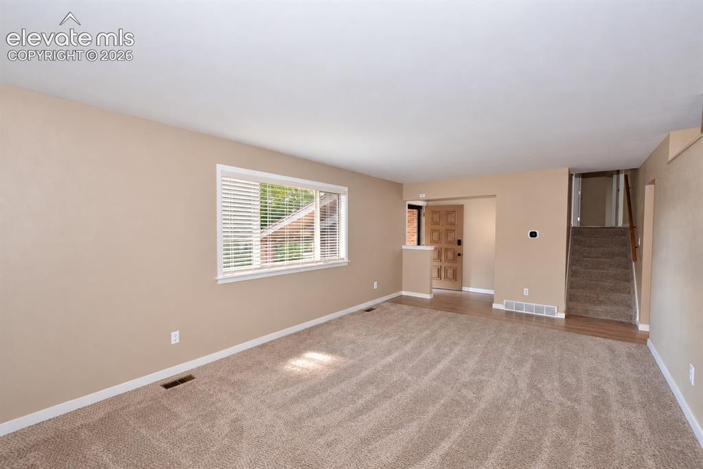 Image 6 of 33: Living room on main level