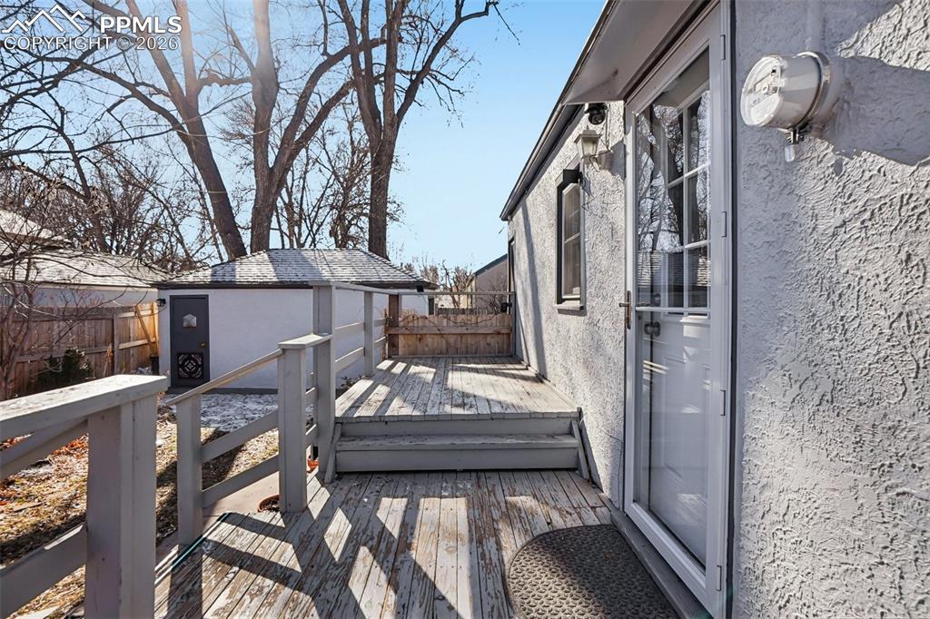 Image 14 of 48: Walk out deck off kitchen