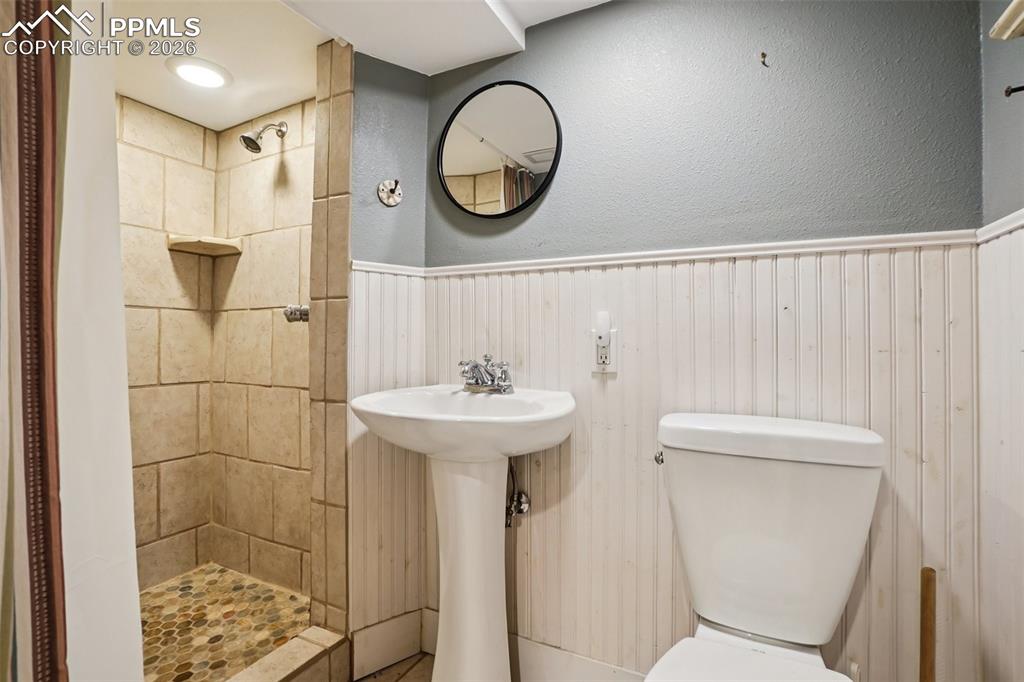 Image 35 of 48: 3/4 bathroom lower level