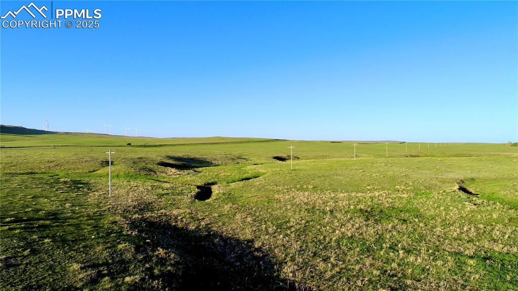Image 4 of 8: View of local wilderness with rural landscape and agricultural land