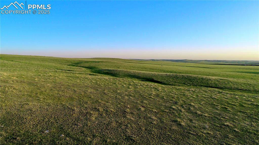 Image 5 of 8: View of undeveloped land with rural landscape