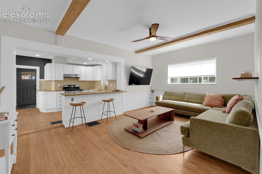 Image 2 of 32: Open-concept living area.