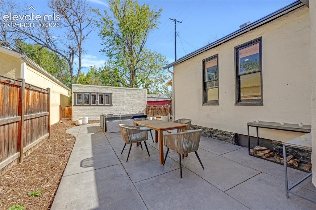 Image 7 of 32: Patio space, great for hosting!