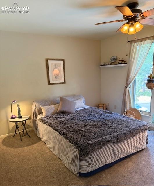 Image 30 of 46: Bi-Level entryway featuring a decorative glass door, tile flooring with an