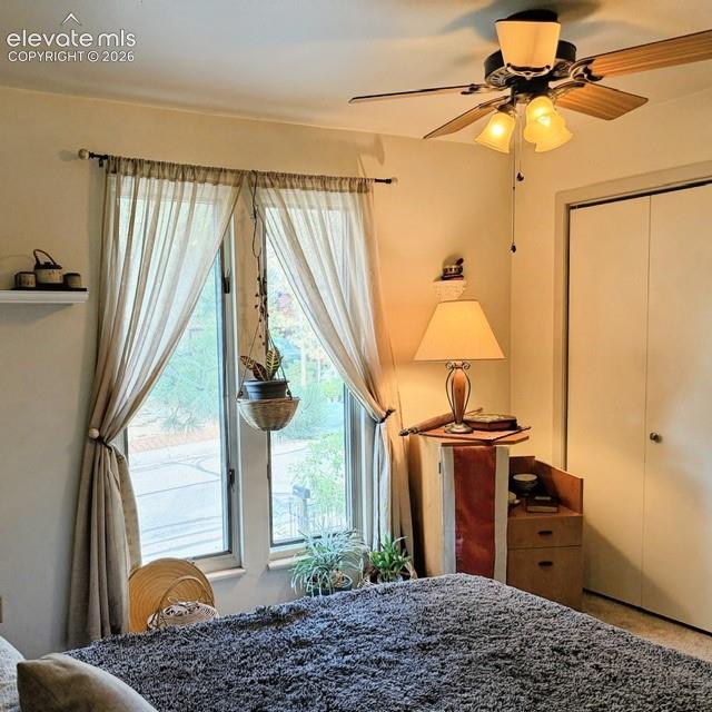 Image 31 of 46: Room featuring neutral-toned walls, a ceiling fan with integrated lighting,