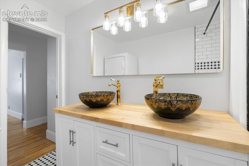 Image 13 of 30: Crisp upgraded bathroom