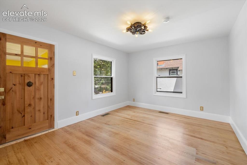 Image 9 of 30: Living room with lots of natural light