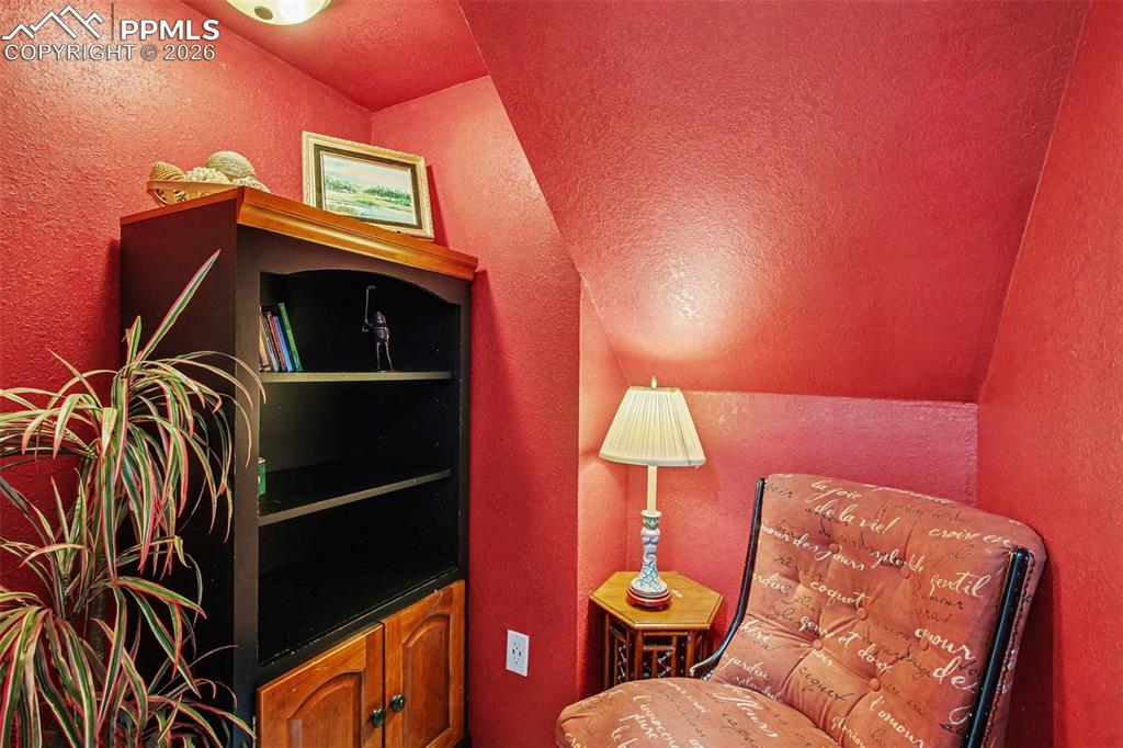 Image 16 of 42: Sitting room with a textured wall