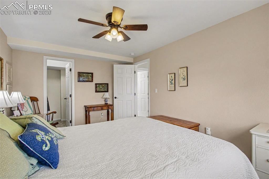 Image 23 of 42: Bedroom featuring ceiling fan