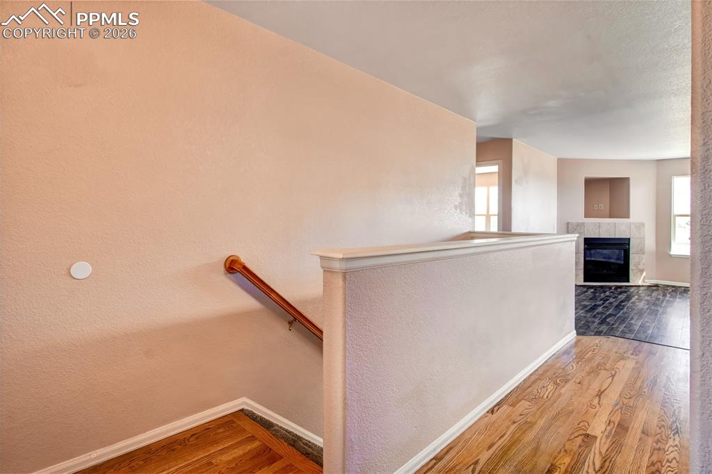 Image 3 of 33: Foyer with wood flooring