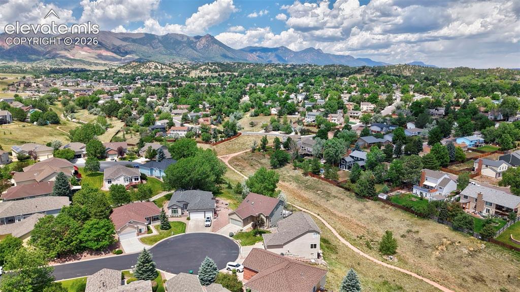 Image 10 of 50: Aerial perspective showcasing a residential neighborhood with varied archit