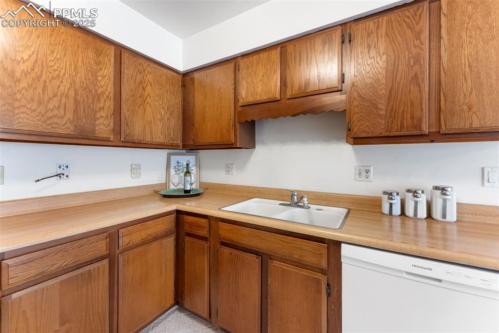 Image 8 of 30: Full kitchen with plenty of counter and cabinet space