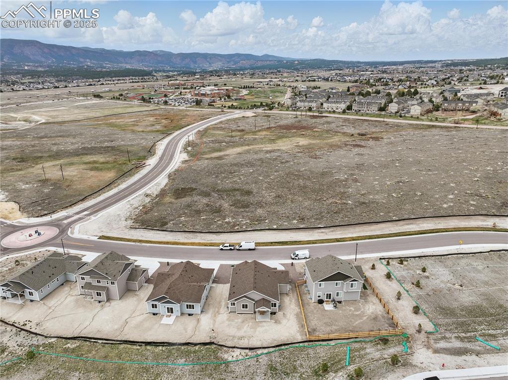 Image 8 of 35: Aerial view with a mountain view and a residential view