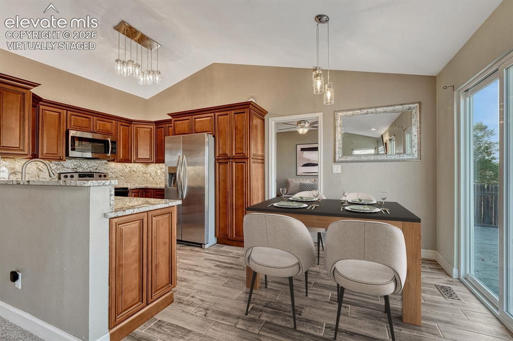 Image 11 of 50: Virtually staged dining room
