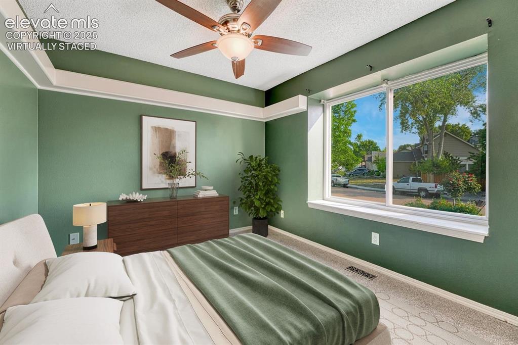 Image 21 of 50: Virtually staged bedroom