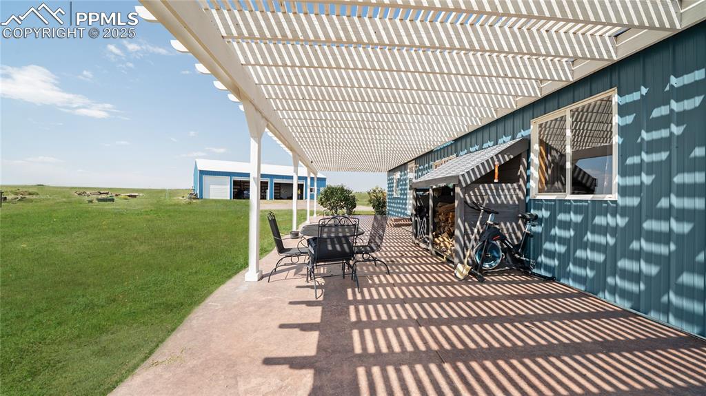 Image 7 of 35: Covered patio