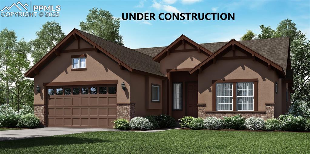 Caption: View of front of property with stone siding, a front yard, roof with shingles, and stucco siding