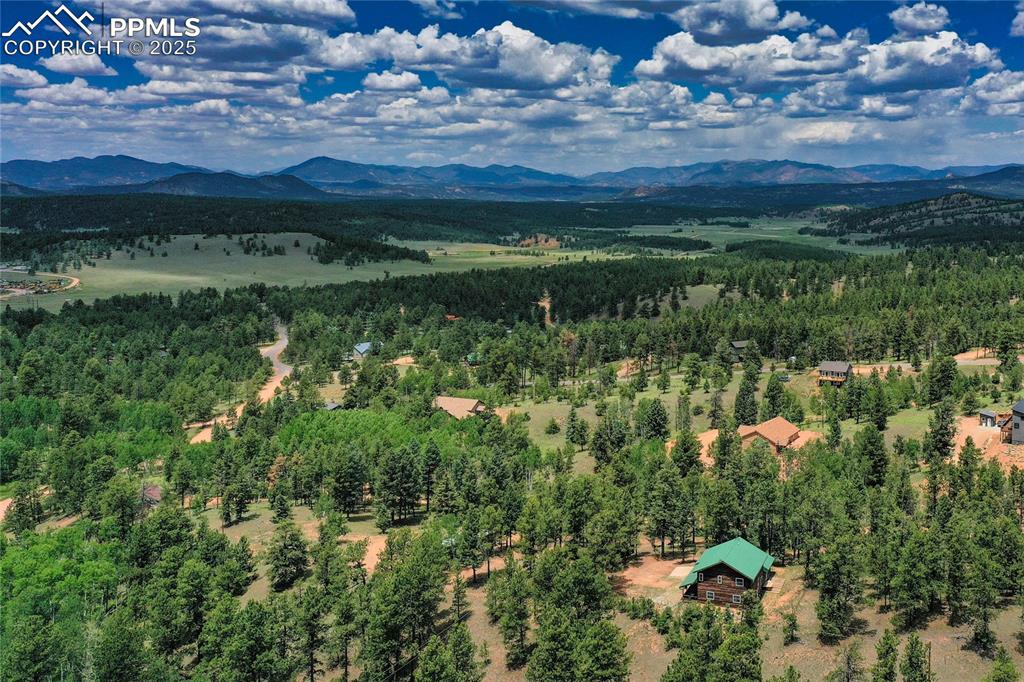 Image 17 of 50: Drone / aerial view of a mountainous background