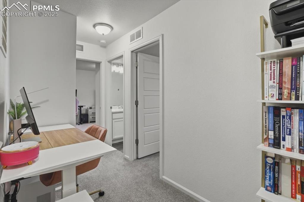 Image 11 of 35: Upper level office area.