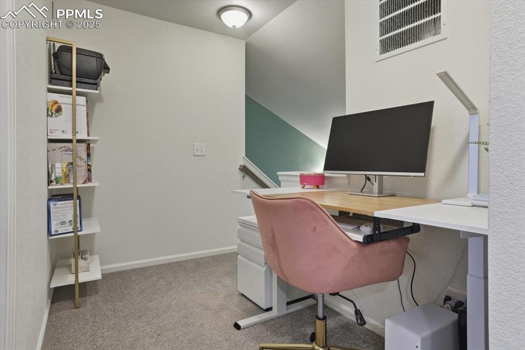 Image 12 of 35: Upper level office area.