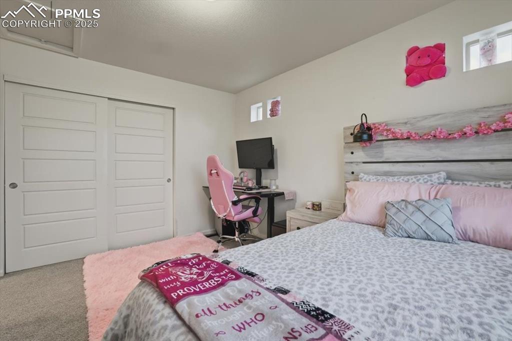 Image 17 of 35: Upper level 2nd bedroom.