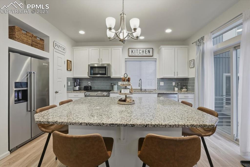 Image 25 of 35: Sliding door to deck.