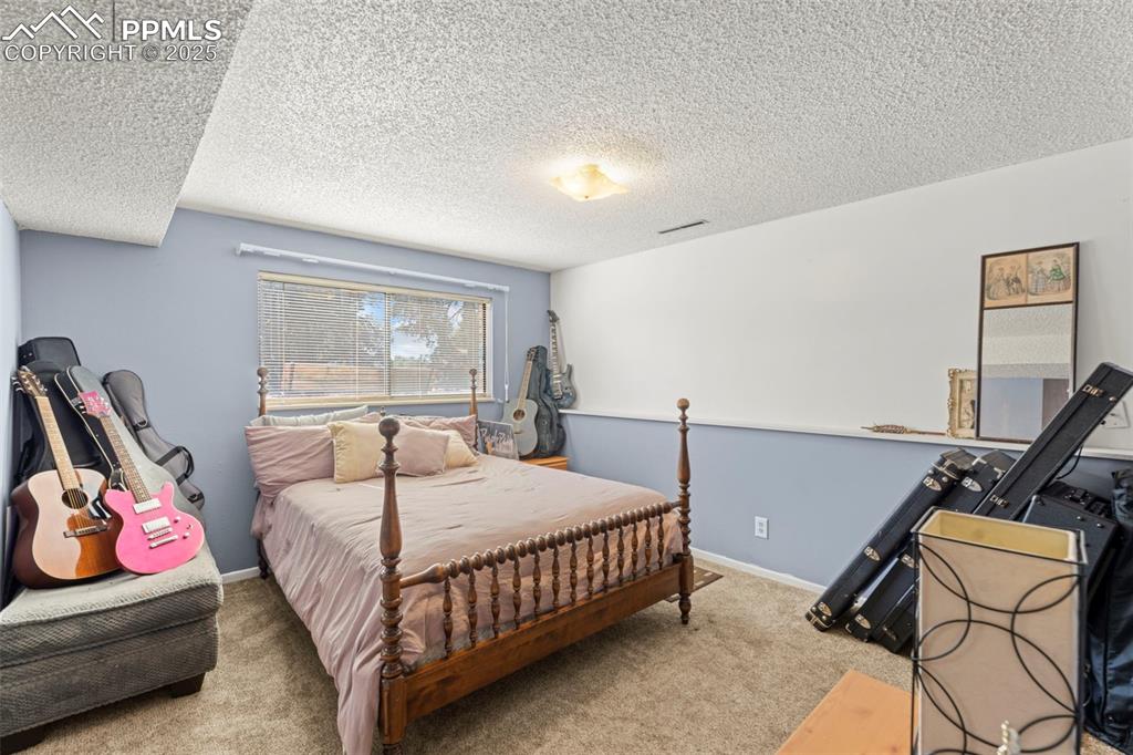 Image 22 of 40: Bedroom