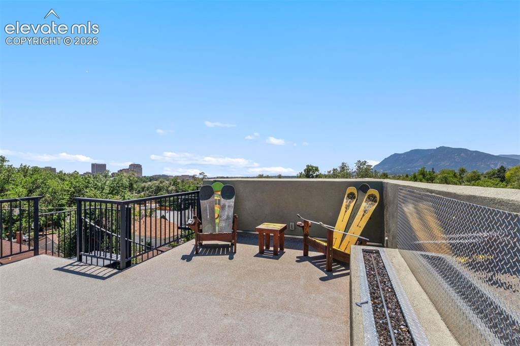 Image 5 of 42: Roof top deck with 360-degree views