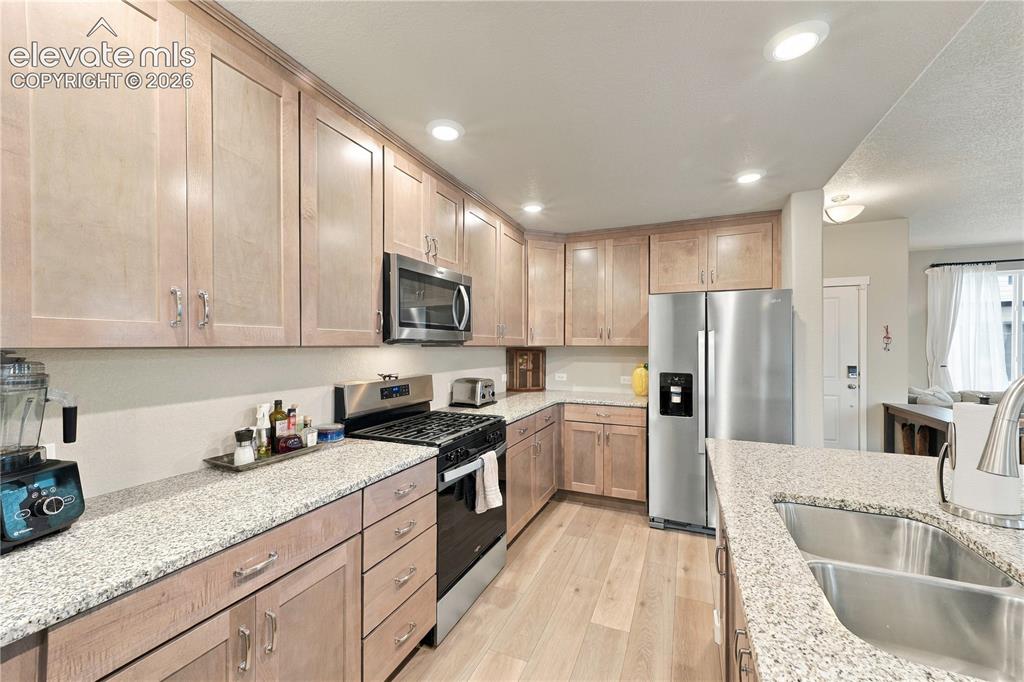 Image 5 of 50: Stainless steel appliances.