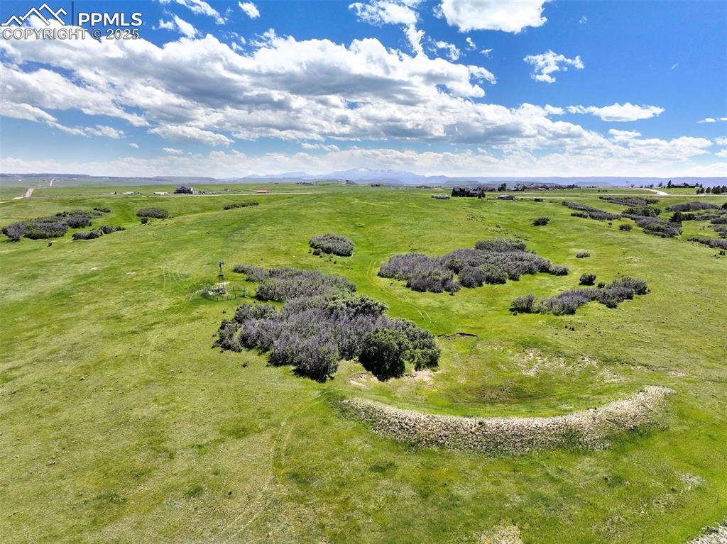 Image 5 of 8: Diverse topography with seasonal pond and natural contours—ideal for livest