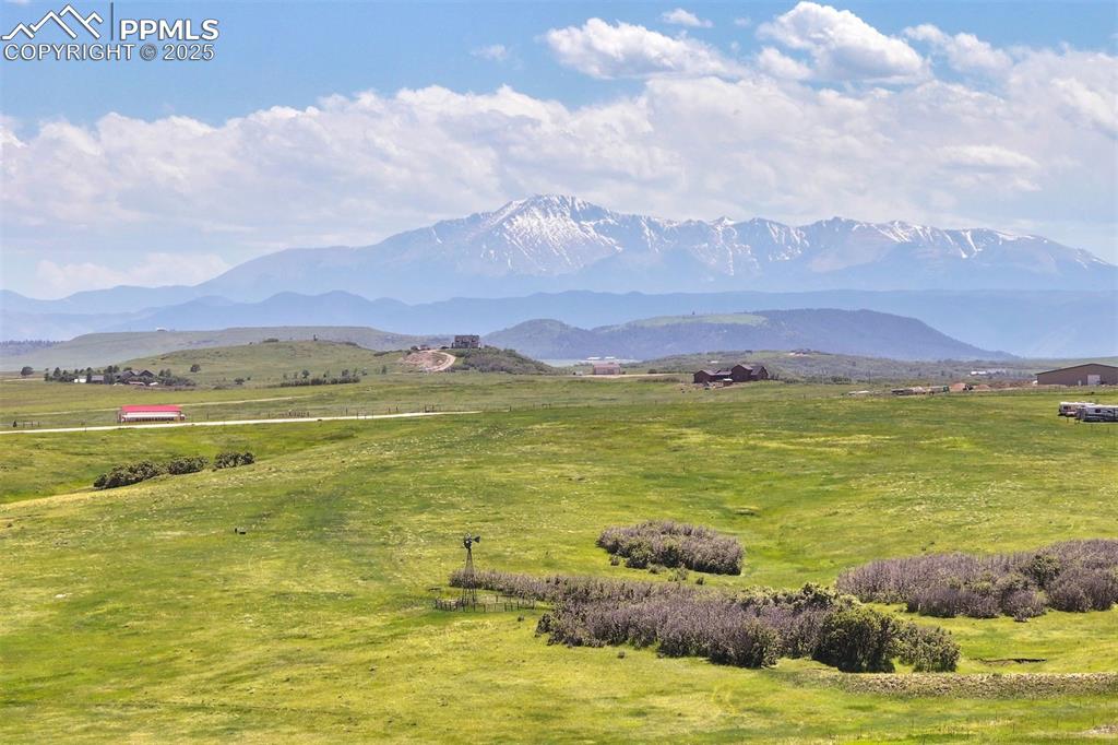 Image 6 of 8: Unobstructed Pikes Peak views stretch across the horizon, creating a specta