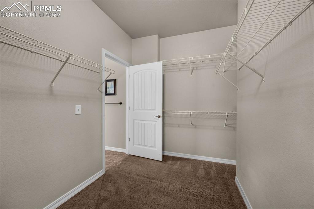 Image 33 of 50: Master bathroom -walk-in shower, walk-in closet, direct access to laundry