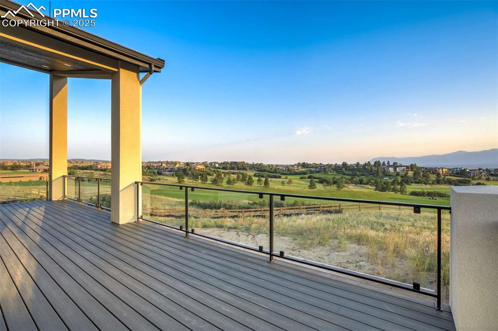 Image 32 of 34: Deck with a mountain view