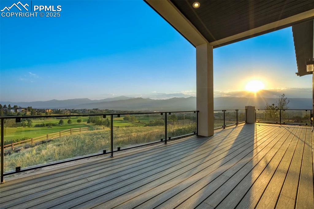 Image 36 of 40: Deck with a patio area, a mountain view, and a view of rural / pastoral are