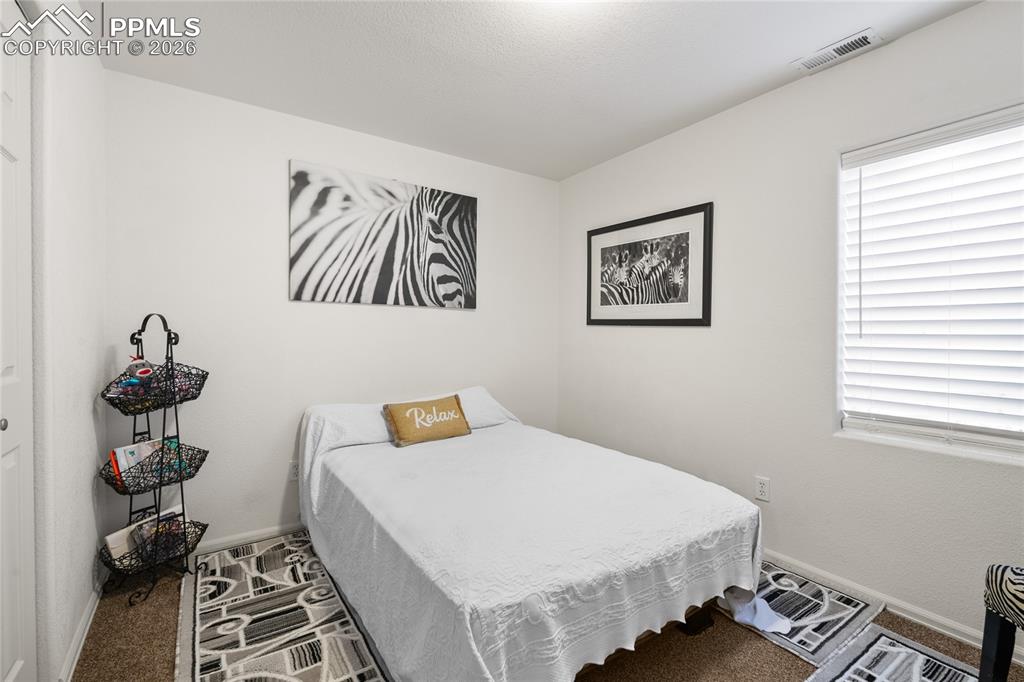 Image 31 of 36: Bedroom