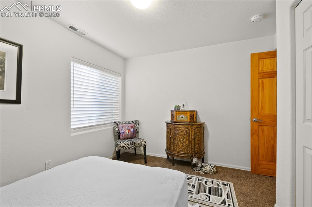 Image 32 of 36: Bedroom