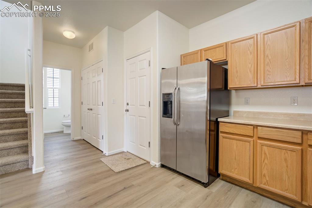 Image 10 of 38: Stainless steel fridge and appliances