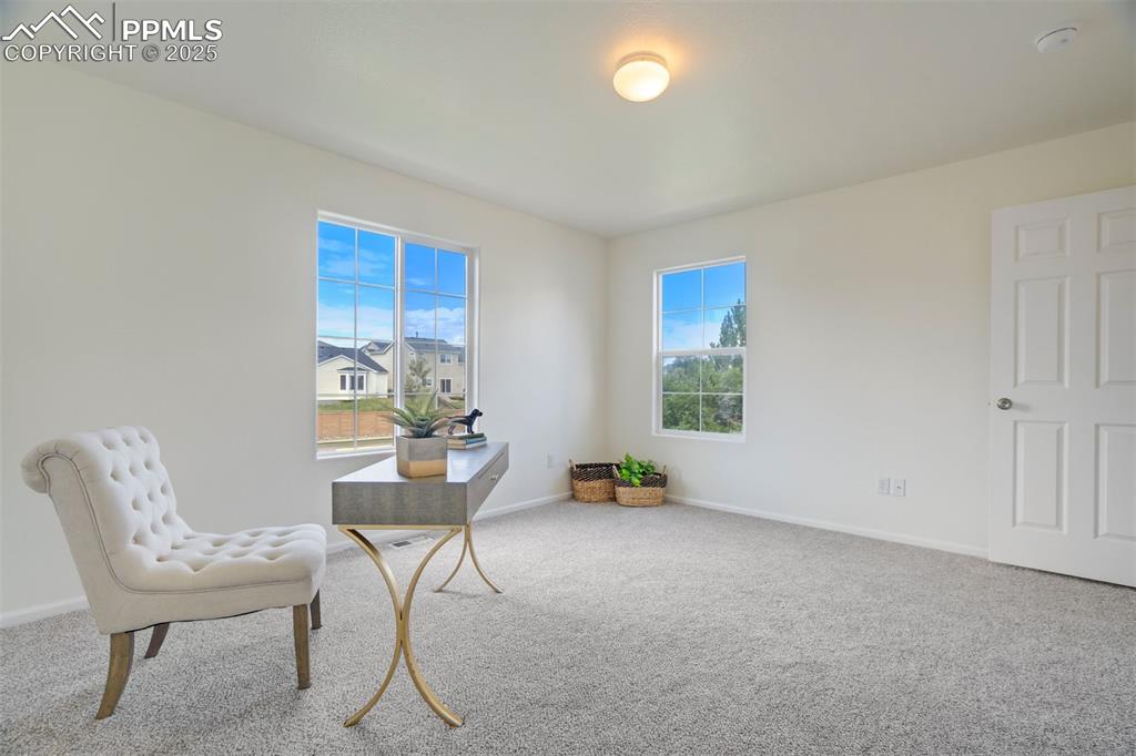 Image 15 of 38: Bedroom being used as an office