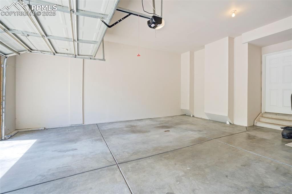 Image 30 of 38: Attached 2 car garage