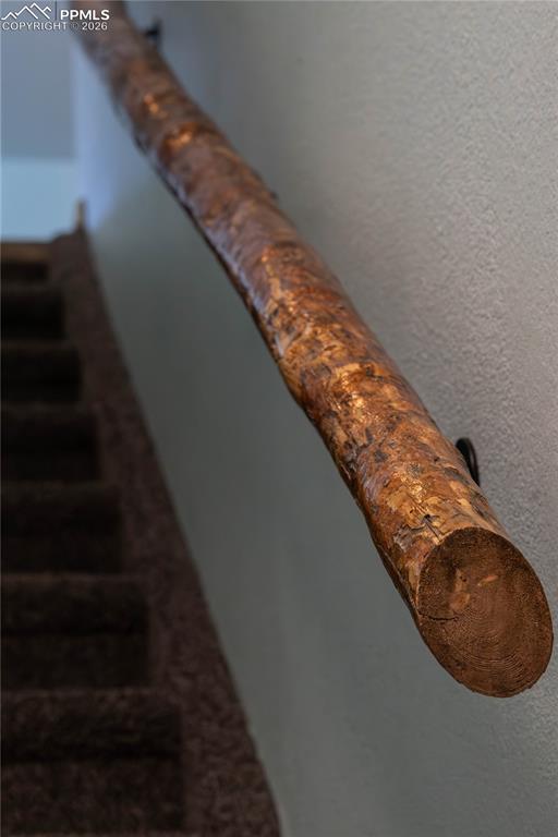 Image 17 of 48: Railing to Basement from Kitchen