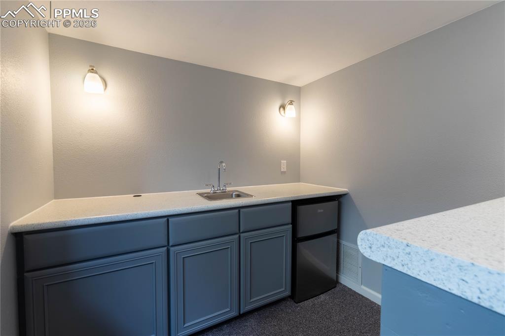 Image 19 of 48: Wet Bar in Basement