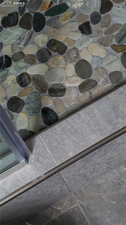 Image 26 of 48: Detail of Shower Tile in Basement Bathroom