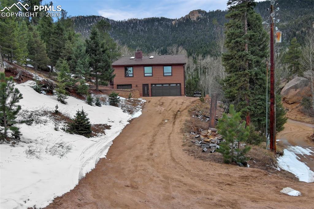 Image 1 of 45: Front of this amazing custom built mountain home!!!