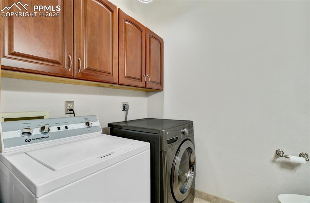 Image 13 of 45: Laundry/Half bathroom on the main level