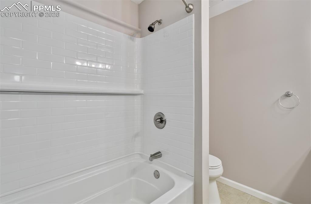 Image 24 of 45: En suite full bathroom off bedroom 2