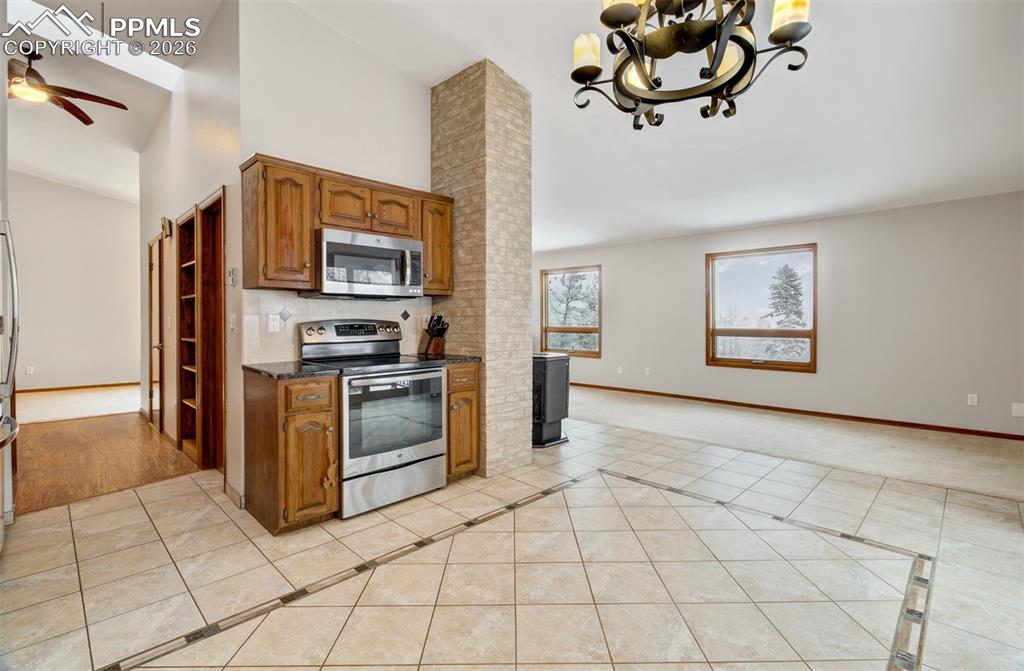 Image 5 of 45: Kitchen and dining area