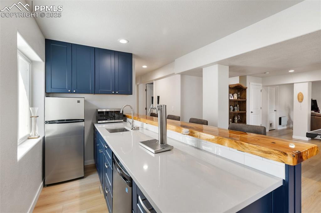 Image 31 of 38: Wet Bar / Beer Taps - Basement 