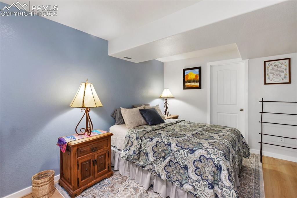 Image 33 of 38: Bedroom - Basement 